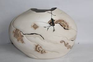 lot 489 image: Artisan Decorative Ceramic Vase with Intricate Carvings