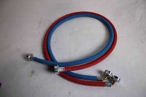 lot 79 image: Set of Red and Blue Washing Machine Hoses with Connectors
