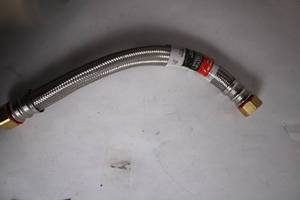 lot 232 image: Everbilt 34 in. FIP x 34 in. FIP 15 in. Stainless Steel Water Supply Line