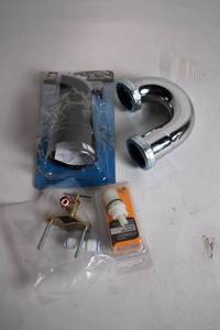 lot 257 image: Lot of Plumbing Parts Including Drain Assembly, Pipe, and Valve Seal