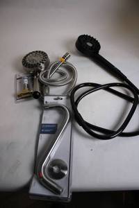 lot 337 image: Plumbing Fixture Set with Multiple Shower Heads and Accessories