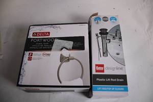 lot 388 image: Delta Portwood Towel Ring and Oatey Plastic Lift Rod Drain Set