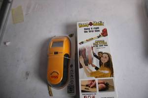 lot 411 image: Hang-O-Matic Wall Hanging Tool Package with Level and Measurement Features