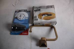 lot 464 image: Lot of Plumbing Supplies Basket Strainers, Wax Ring, and Durable Towel Bar
