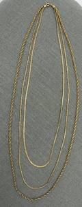 lot 12 image: RYTHM Triple 12Kt Gold Filled Chain Necklace with Varied Link Designs