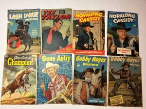 lot 64 image: Collection of 8 Golden Age Western Comic Books