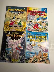 lot 68 image: Set of 4 Uncle Scrooge & Donald Duck Comic Books