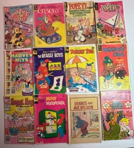 lot 102 image: Collection of 12 Vintage Comic Books Featuring Disney, Popeye, and Woody Woodpecker