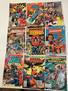 lot 328 image: Collection of 9 Vintage Comic Books Featuring Superheroes Steel Sterling, Justice League, The Eternals & More
