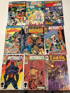 lot 329 image: Collection of 9 Vintage Comic Books Including Micronauts and Turok Dinosaur Hunter