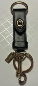 lot 337 image: Coach Black Leather Keychain Trigger Snap Bag Charm