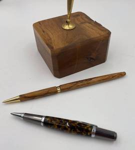 lot 229 image: Wooden Pen Holder with Two Decorative Pens