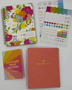 lot 233 image: Set of Cultivate What Matters Goal Planner and Celebrations Notebook