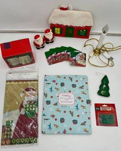 lot 256 image: Holiday Decor Collection with Santa Salt Shakers and Angel Candle Holders
