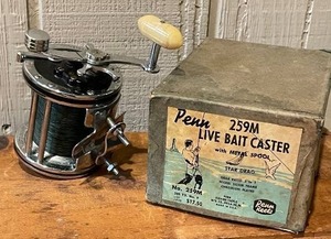 lot 309 image: Vintage Penn 259M Live Bait Caster Reel with Original Box and Manual