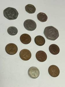 lot 353 image: Collection of 13 UK Coins featuring Queen Elizabeth II