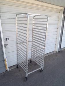 lot 16 image: Tall Commercial Aluminum Bakery Rack with 20 Pan Slots and Wheels