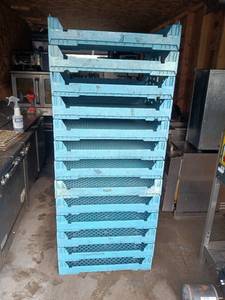 lot 44 image: Stack of 13 Blue Pantry Pride Plastic Bread Crates