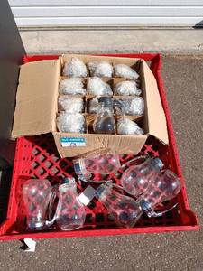 lot 63 image: Collection of Coffee Items Syrup Dispensers, Carafes, and Coffee Packages