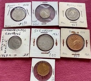 lot 34 image: (7) Vintage Mexico Coins