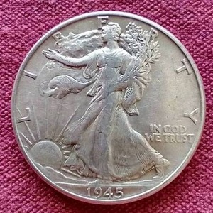 lot 102 image: 1945 Walking Liberty Half Dollar