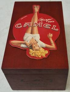 lot 24 image: (1) Cao Gold Cigar Box Converted to a Coaster Holder & Camel Ginger XOXO Coasters 2004 - Wrapped in Plastic   (View Photos)