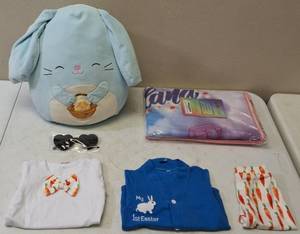 lot 31 image: Get Ready for Easter (1) Squish Mallows Easter Bunny (1) Pair of Heart Shaped Sunglasses - Black (1) Unicorn Kids Bath & Beach Set & (1) My First Easter Outfit (View Photos)