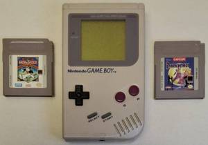 lot 36 image: Nintendo GAME BOY  Two Games (1) Monopoly (1) Darkwing Duck (View Photos)