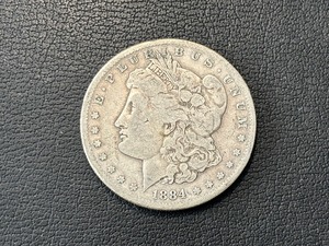 lot 13 image: 1884-S Morgan Dollar
