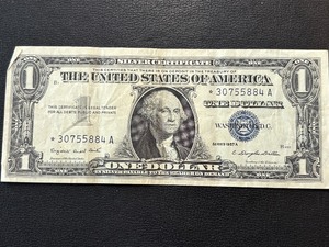 lot 109 image: 1957 A Blue Seal $1 Dollar Silver Certificate Star Note