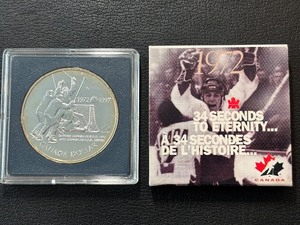 lot 126 image: 1997 Canada Silver Dollar Canada-Russia Hockey Series Coin