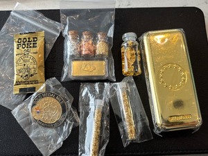 lot 170 image: Gold Plated Bar, Gold Flakes in Tubes, Bottle Opener