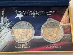 lot 157 image: Morgan and Peace Dollars