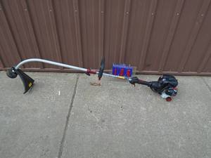 Craftsman 2 cycle weed trimmer. Looks like very little use. As shown.