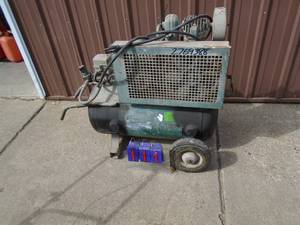 Rollair 110 volt air compressor . 3 hp? Used condition. Been holding air for a couple weeks. As shown.
