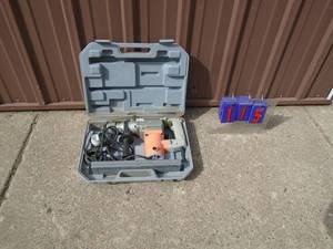 lot 115 image: Chicago Electric hammer drill with bits in case. Tested & works. As shown.