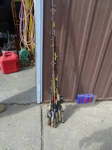 lot 120 image: Misc fishing rods & reels. As shown.
