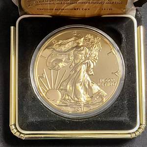 2011 Golden Eagle - One Troy Ounce(.999 Fine Silver) - Double plated with&nbsp; 24K Gold .&nbsp; The Silver American Eagle is the largest and heaviest coin ever minted by the U.S. government.