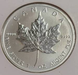 lot 14 image: 2011 -  1 Oz. Silver Canadian Maple Leaf