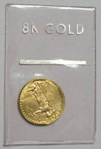 Mint 8K Gold Eagle  (1.6 Grams/33.3% of pure Gold).