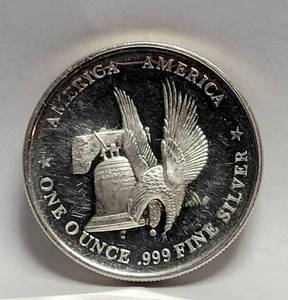 lot 59 image: 1 Troy Oz. Fine Silver Round -  AMERICA  AMERICA