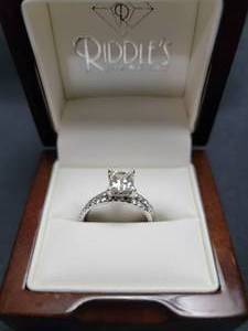 Ladies 14 kt White Gold wedding set (size 7) with a 1.50 carats princess cut Lab Diamond.&nbsp; Appraised Value 7375.00 - See Picture of Appraisal for Details.&nbsp;