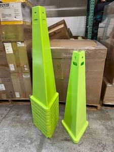 lot 93 image: MSRP $800 Lot Of 10 Impact&nbspPlain 3-Sided Safety Signs Cones -Highly visible fluorescent yellowgreen. Warns of potential hazards helps reduce injuries & liabilities -Keyholes on the sides to attach chains or barricades to create a large barrier