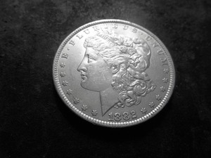 lot 8 image: 1882 O Silver Morgan Dollar