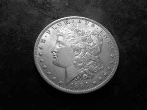 lot 10 image: 1884 O Silver Morgan Dollar