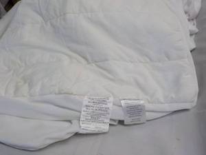 lot 47 image: Twin Size Mattress Pad...