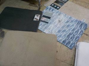 lot 61 image: 9 Area and Bath Rugs- all need clea...