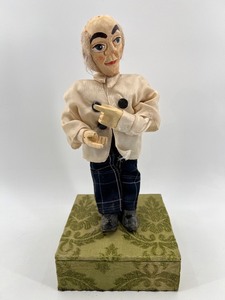 lot 5 image: Vintage Animated Music Box Figure on Decorative Base