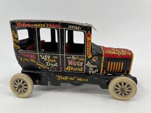 lot 11 image: 1940s Marx Tin Wind-up Toy Car - Old Jalopy Design