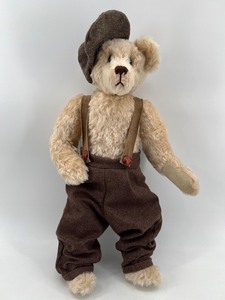 lot 21 image: Vintage Patty Gorman Mohair Teddy Bear with Brown Tweed Outfit